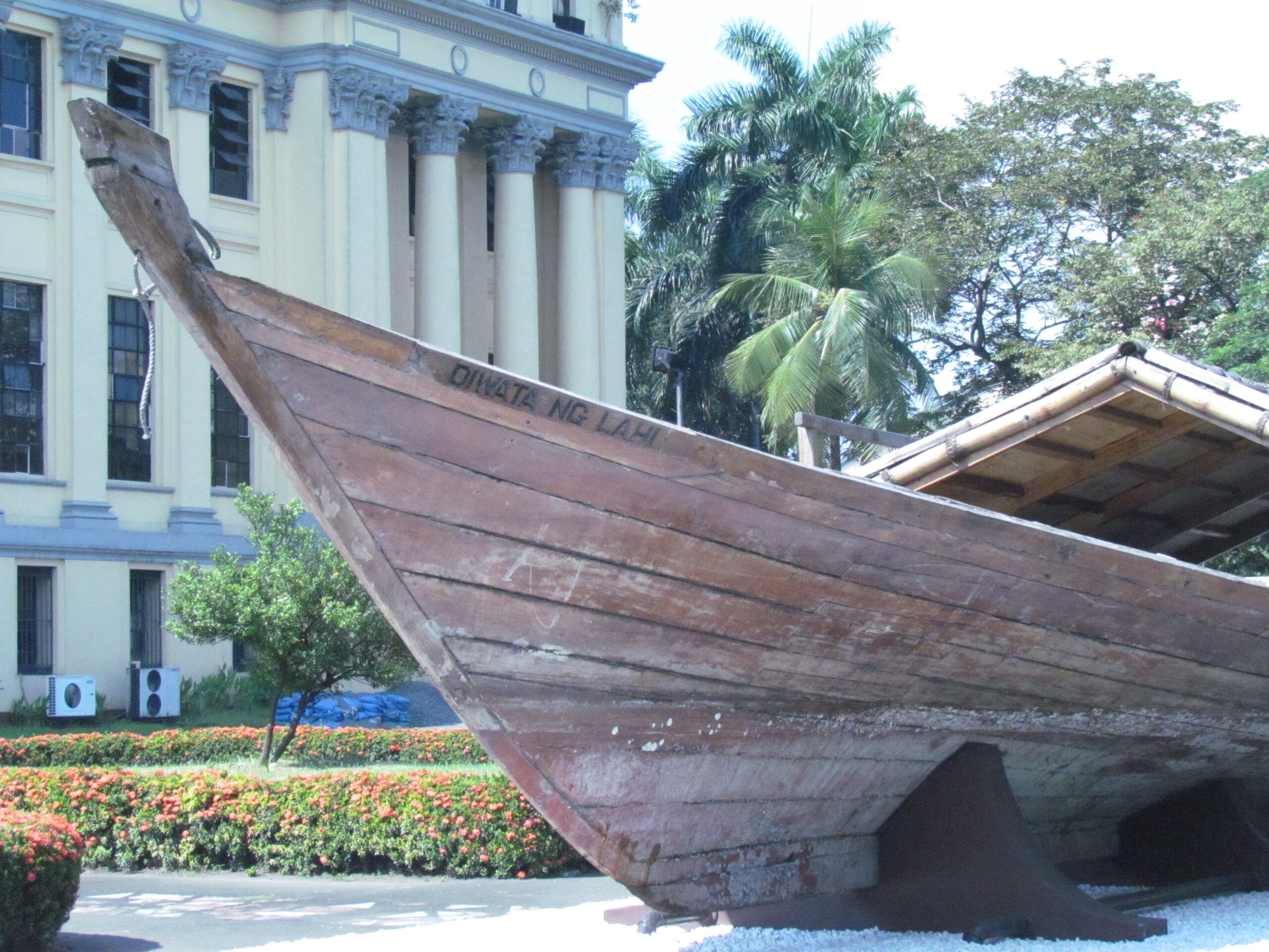 Reconstructed boat in front of a museum