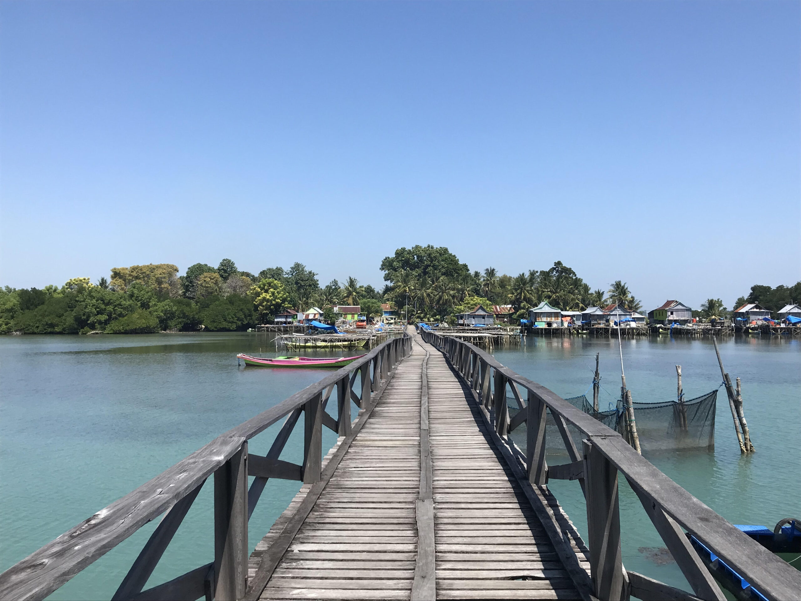 Wooden bridge leads to island